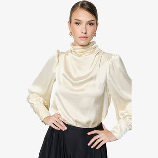 Champagne satin mock neck blouse with puff sleeves and draped neckline