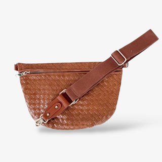 Woven faux leather crossbody belt bag with adjustable strap and zipper closure, shown in brown and ivory for a chic, hands-free everyday look.