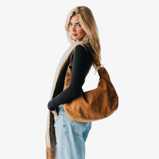 Hazel Hobo Shoulder Bag in tan suede with fringe detail and slouchy hobo silhouette