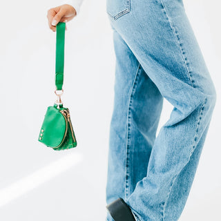 Wonderlust Dual Pouch Wristlet with gold zippers and wide strap