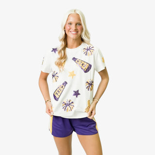 Woman wearing a Cheer Sequin Tshirt with purple shorts on a white background