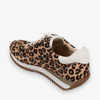 Leopard print sneaker with white sole on a light gray background