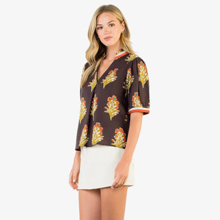 Brown floral blouse with short sleeves and split neckline