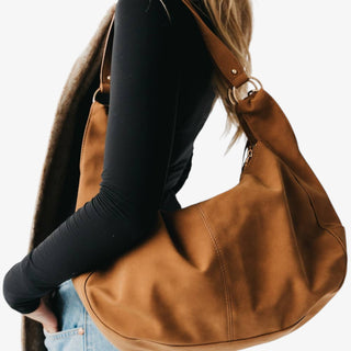 Hazel Hobo Shoulder Bag in tan suede with fringe detail and slouchy hobo silhouette