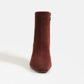 Brown suede ankle boot on a white background