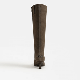Brown knee-high boot, kitten heel and Circus by Sam Edelman hardware emblem on a white background