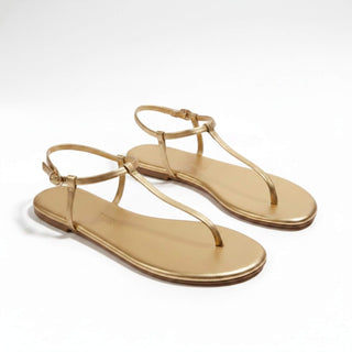 women’s flat sandals gold metallic Tkees Mariana strappy sandal summer casual angled view