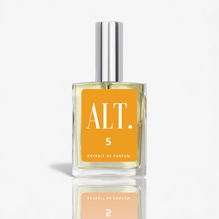 ALT. No 5 perfume bottle with an orange label and silver cap on a white background