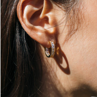 Anna Crystal Earrings in gold with CZ stones, small hoop huggie design with polished finish for timeless sparkle.