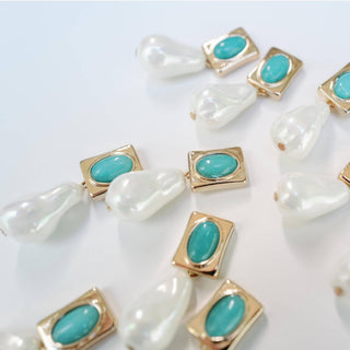 Turquoise and pearl drop earrings with gold accents and oversized pearl design front product view