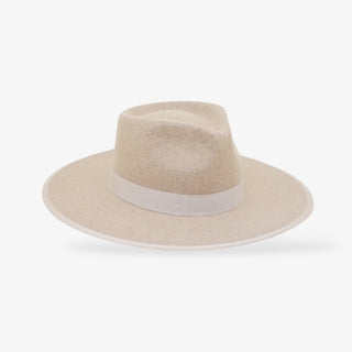 Beige fedora hat with a wide brim on a white background