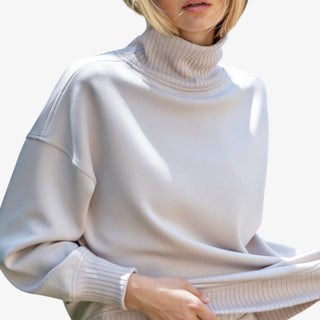 Neutral modal scuba ribbed mock neck pullover on model