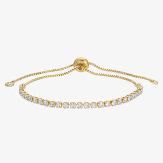 Gold bracelet with diamond accents on a white background