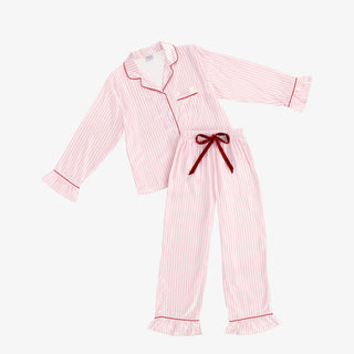 Pink stripe pajama set with long sleeve button top, red piping, ruffle cuffs, and elastic waist pants with velvet tie.