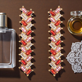 Emily red crystal dangle earrings with baguette-cut stones in gold-tone setting