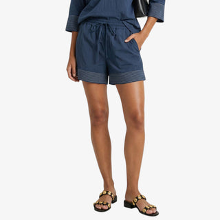 Navy drawstring shorts with white contrast stitch hem and elastic waistband