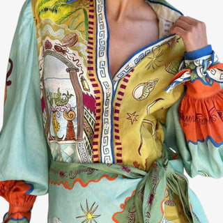 Surreal print mini dress with artistic scarf print and wrap waist front view