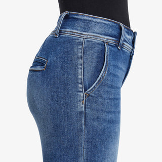 High-rise straight leg jeans with raw hem in medium wash denim