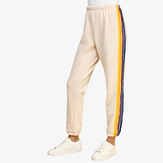 Cream sweat pant with multi-color side stripes and elastic cuffs