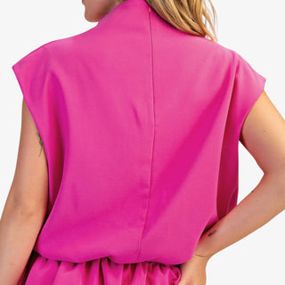 Mock neck balloon top in hot pink with draped silhouette and cap sleeves
