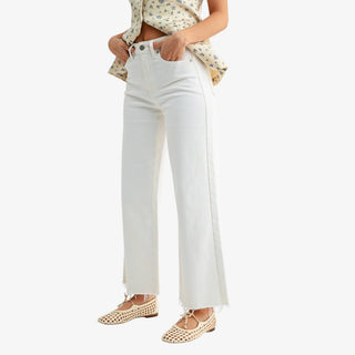 White high rise denim jeans with relaxed wide leg silhouette