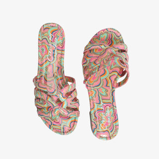 Colorful patterned flip-flops on a white background