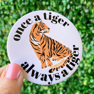 3-inch Once a Tiger Always a Tiger game day button with an orange tiger illustration and black lettering on a light lavender background, front view