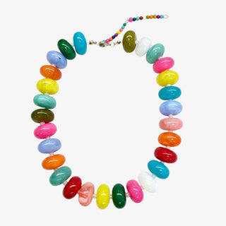 Chunky beaded necklace in multi color with glossy oversized beads and gold clasp for statement jewelry flat lay view