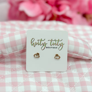 Gold bunny earrings on a 'hoity toity boutique' card with a pink checkered background
