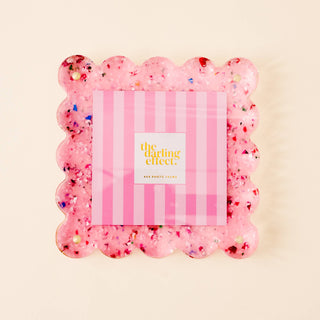 Pink confetti square acrylic frame with scalloped edges.