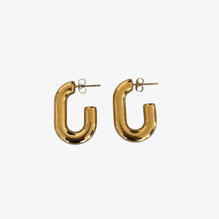 Small oval hoop earrings in 18K gold plated stainless steel with polished gold finish on neutral background