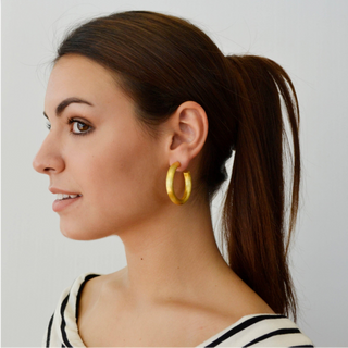 Betty Carre Laurence gold-plated hoop earrings with a brushed matte finish in an open-hoop design