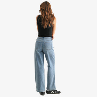Slim wide leg sweat-denim jeans with high rise, slim top block, and relaxed wide leg fit.