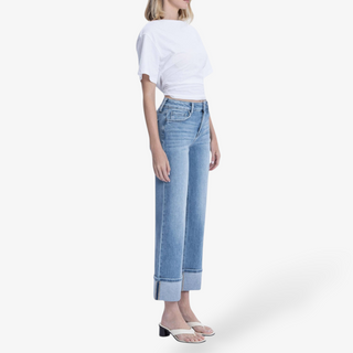 Light wash cuffed slim wide leg jeans side  view on a white background