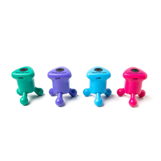 Four colorful massagers on a white background