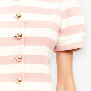 pink striped skirt set gold button detail puff sleeve textured fabric close up view
