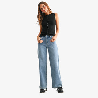 Slim wide leg sweat-denim jeans with high rise, slim top block, and relaxed wide leg fit.