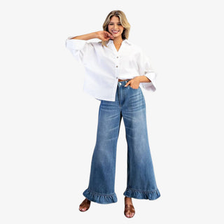 high rise wide leg jeans with ruffle hem detail womens statement denim pants with flare leg and feminine ruffle ankle design