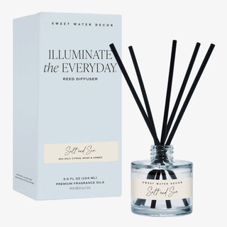 Salt and Sea reed diffuser with powder blue glass bottle and coordinating coastal blue packaging on white background