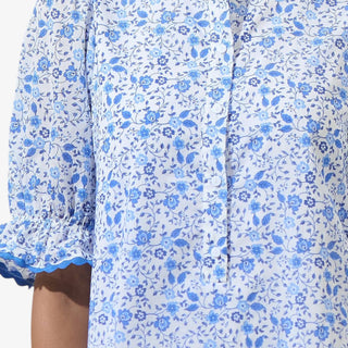 Blue floral mini dress puff sleeve waist tie ruffle detail front view