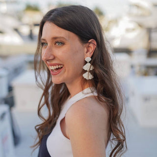 white shell drop earrings lightweight mermaid style tiered design front view