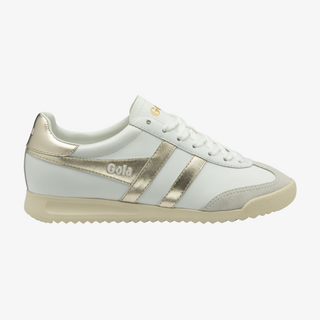 White sneaker with gold accents on a white background