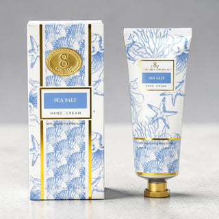 sea salt hand cream tube and box with blue coastal print and gold accents 8 oak lane 3.4 oz