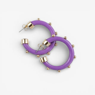Purple small hoops with gold dot accents throughout, laying flat on white background.