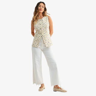 White high rise denim jeans with relaxed wide leg silhouette