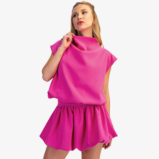Mock neck balloon top in hot pink with draped silhouette and cap sleeves
