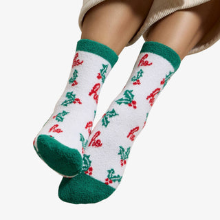 Holiday Fuzzy 4-Pack Socks Gift Set featuring festive Christmas designs in  red, and green