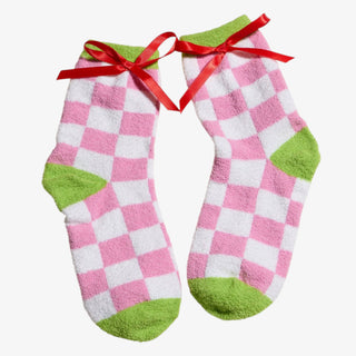 Holiday Green Monster Sock Set with pink and green fuzzy socks featuring festive Christmas designs
