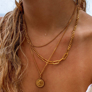 Three Little Birds gold necklace with dainty charm details