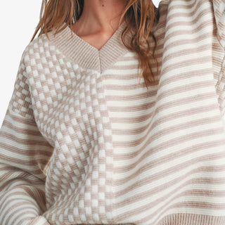 Frenchy Sweater in neutral check and stripe knit with V-neck and relaxed fit